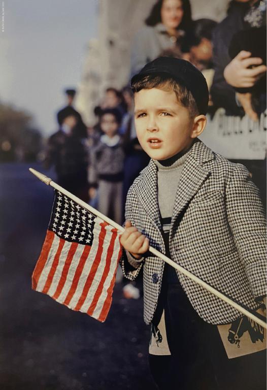 Ruth Orkin Boy with flag 1949 RUTH ORKIN by SIAE 2023