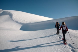 Enjoying snowshoeing and gourmet dishes in La Thuile